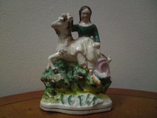 19th century Staffordshire figurine Victorian girl riding side-saddle on a goat