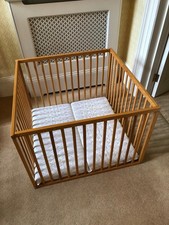 Babydan wooden playpen with boarded base and quilted mat