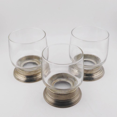 Three pewter mounted - glasses, ~