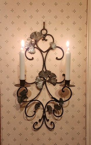 Wrought iron wall sconce for
