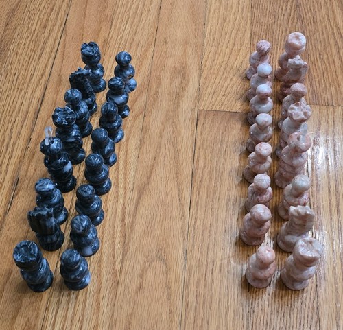 Hand carved stone - hand, chess