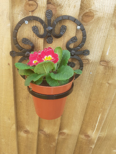 Solid wrought iron garden wall - garden,