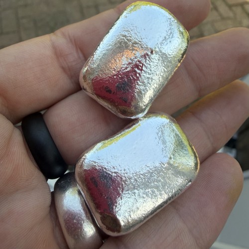 Hand poured fine silver - hand,