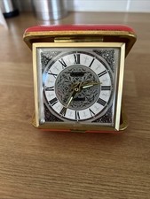 Rhythm Square Clock in case