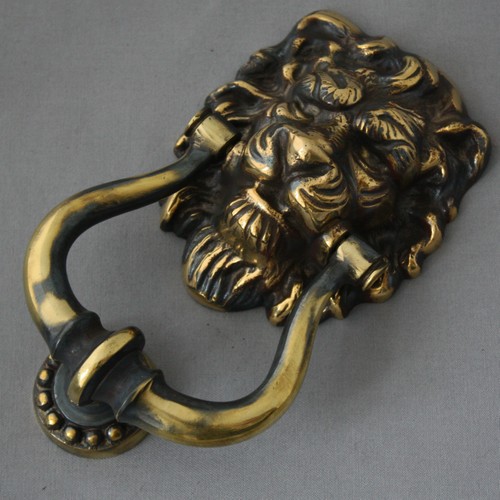 Brass lions head door - brass,