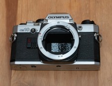 Silver Olympus OM10 35mm SLR