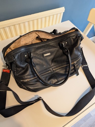 Storksak black leather baby