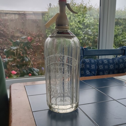 Antique soda syphon etched