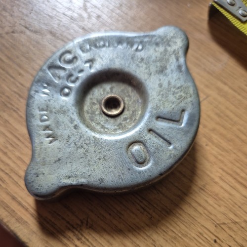 Engine oil filler - cap, made