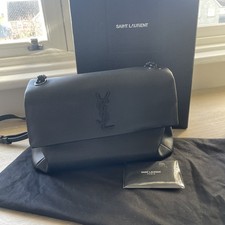 Saint Laurent  YSL  West