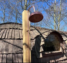 Outdoor sauna shower. Cold