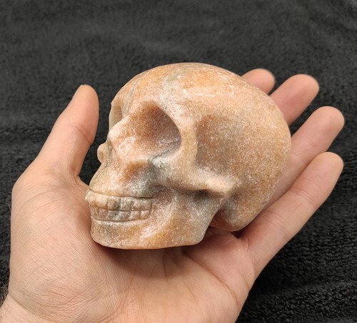 Orange calcite skull carving - skull,
