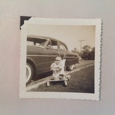 Vintage B&W Photograph Baby In Quadracycle By Car Parked on Median Street Race
