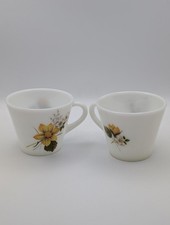 two vintage Pyrex teacups in