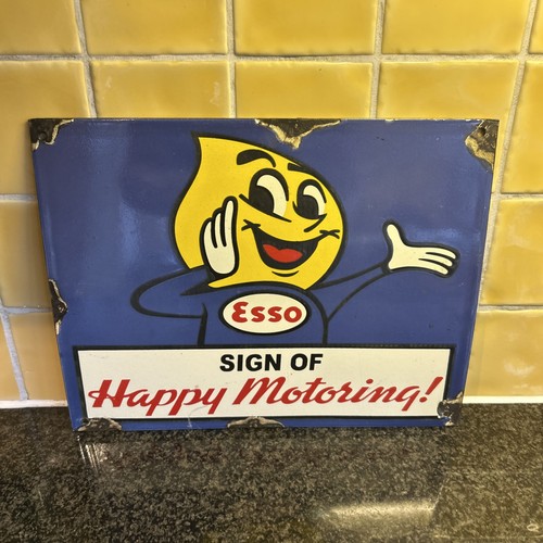 Esso oil sign happy - sign,