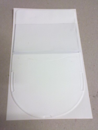 White shield shaped tax disc - shield,