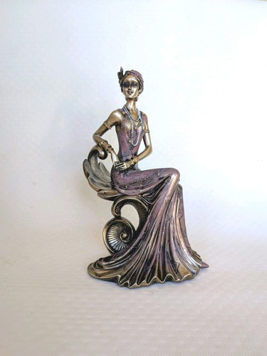 Art deco style seated flapper - deco,