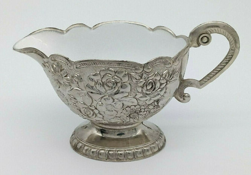 Creamer embossed flower design - embossed,
