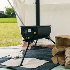 Bell tent stove by Canvas tent