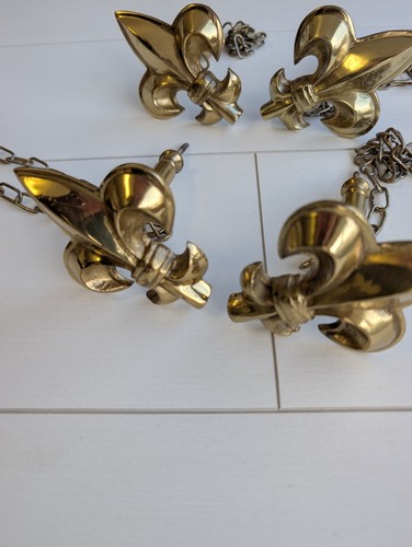 Brass tie hold backs - tie,