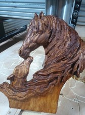large wooden animal carvings