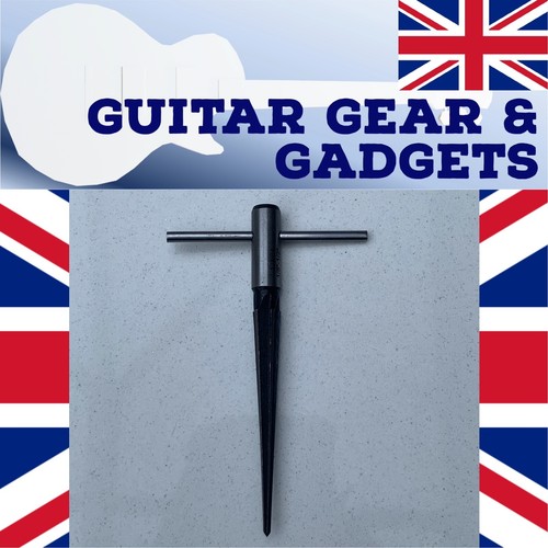 Guitar bridge pin hole - guitar,