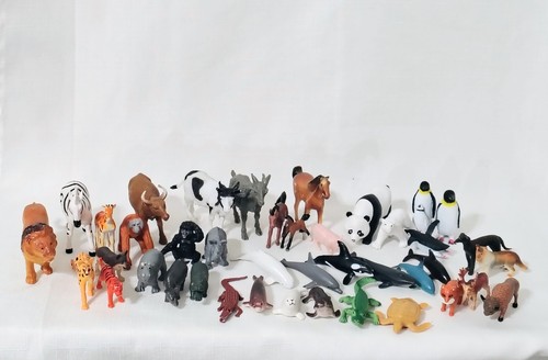 Small plastic toy animals - plastic,