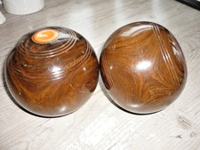 TWO THURSTON LIGNUM VITAE BOWLS