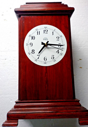 Tall wooden mantle - clock, with