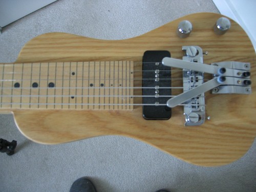 Lap steel guitar - lap, in