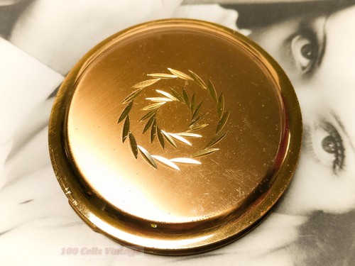 Gold tone art deco - , radial