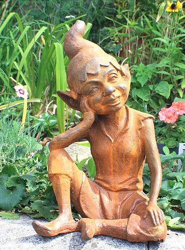 Cast iron seated pixie - iron, elf