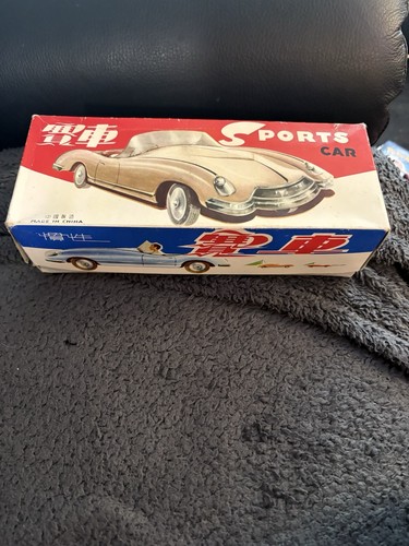 Vintage old tin sports car - old,