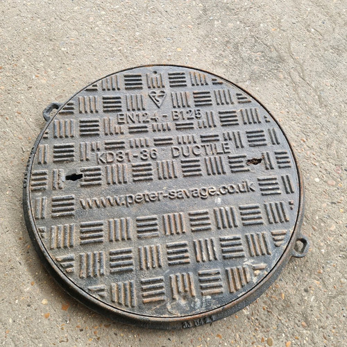 Round cast iron manhole - cast,