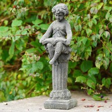 Cast Iron Reading Cherub