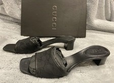 Gucci GG black leather mules/ sandals