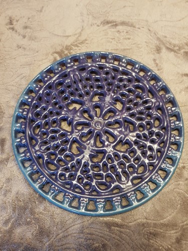 Round blue cast iron trivet - cast,