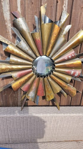 Sunburst metal framed wall - sunburst,