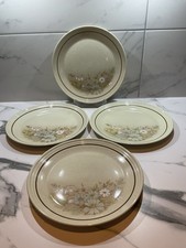 Four Royal Doulton 10 Inch
