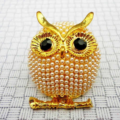 Stunning gold tone owl faux - stunning,
