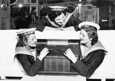 Three young women present a