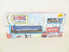 REALTOY 'UNDERGROUND TRAIN, LONDON BUS & AUSTIN FX4 TAXI. 1:64. MIB/BOXED