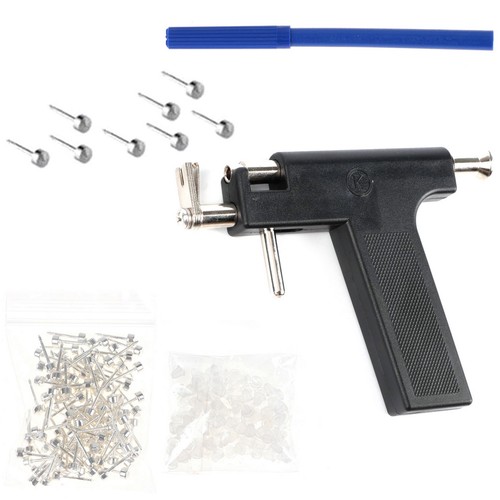Ear piercing with 98pcs studs - ear,