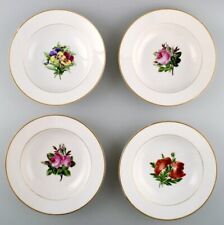 4 antique Royal Copenhagen deep plates in Flora Danica style.