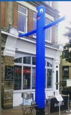 Blue wavy man with blower