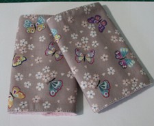 BABY CARRIER DRIBBLE/SUCK