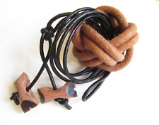 1 Woggle (scarf ring) + 1 Wood badge 2 beads (wooden badge).