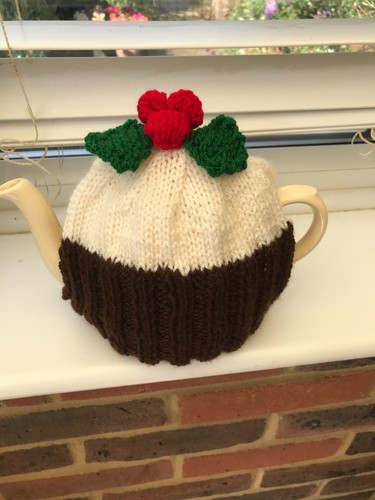 Hand knitted christmas pudding - hand,