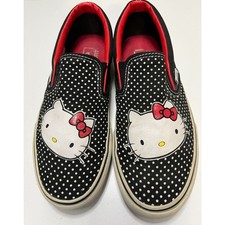 Vans black and white polka dot Hello Kitty classic slip-ons. Size 5.5(M); 7(W).