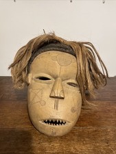African Carved Wood Mask With